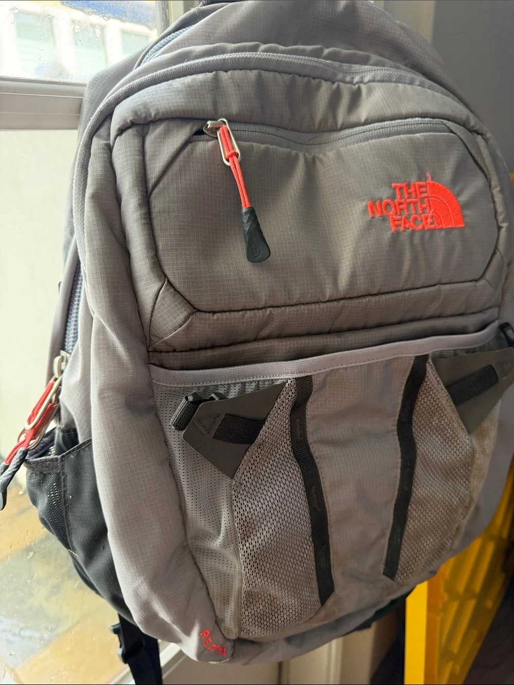 The North Face Gray Backpack with Neon Pink Accents